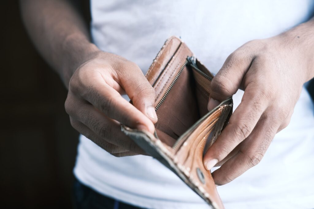 empty wallet being held open 